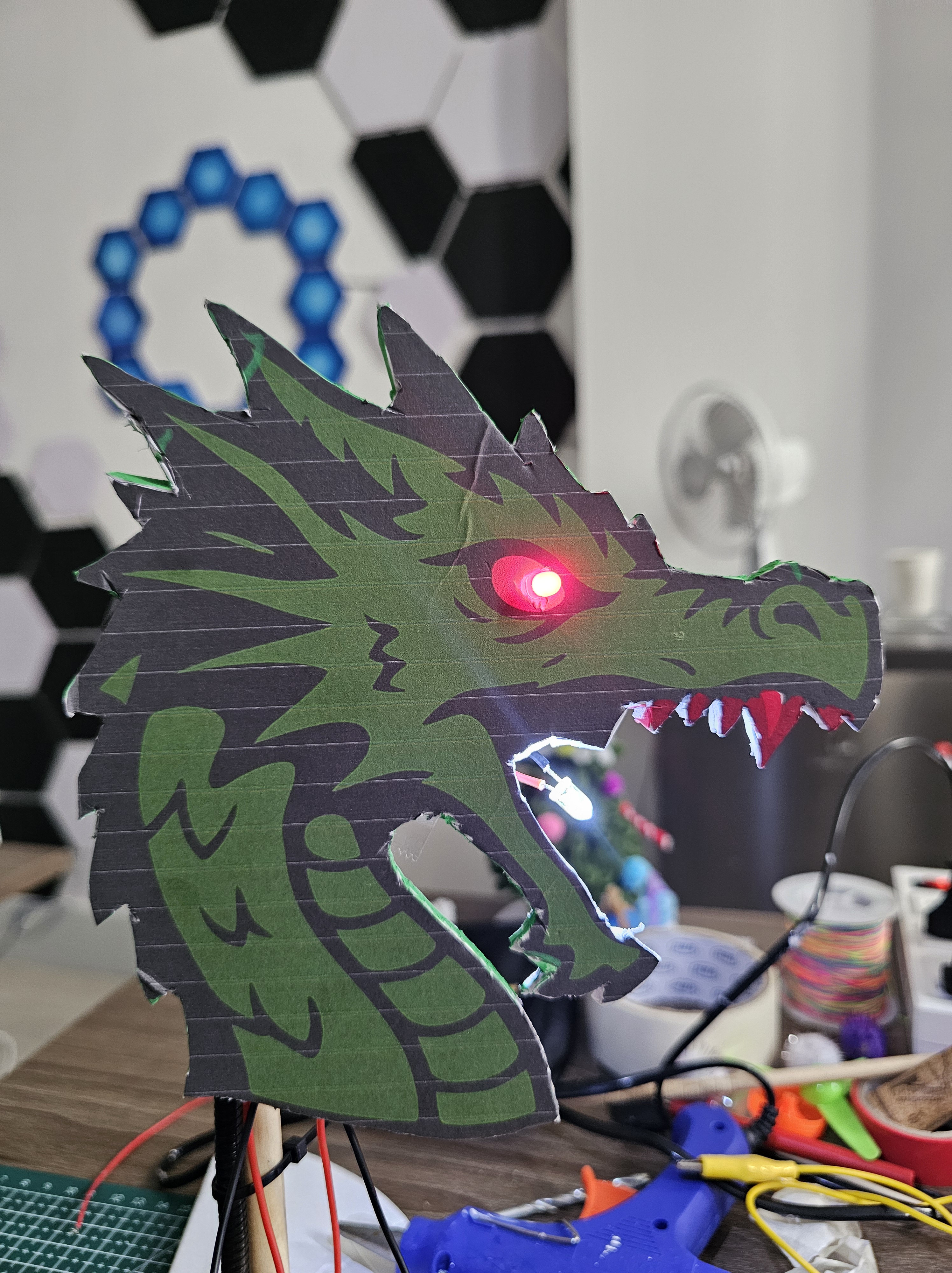 Students building electronic circuits with Micro:bit microcontroller in beginner maker class