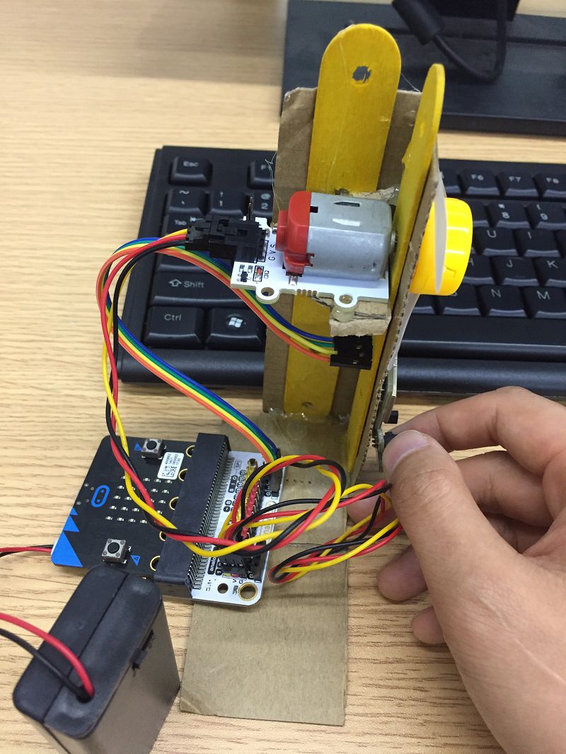 Smart Fan Spinner driver board with servo or DC motor powering a cardboard fan